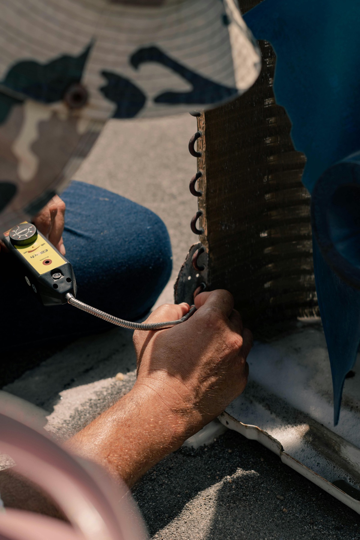 Close-up of air conditioning repair work